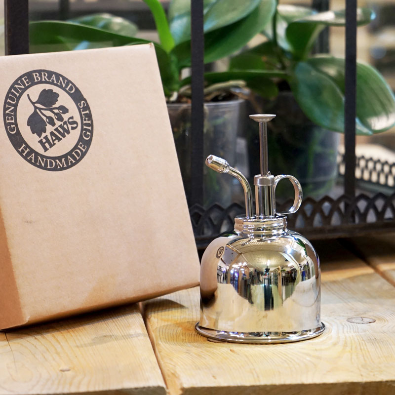 Sprayflaskor och blomsprutor för växtskötsel